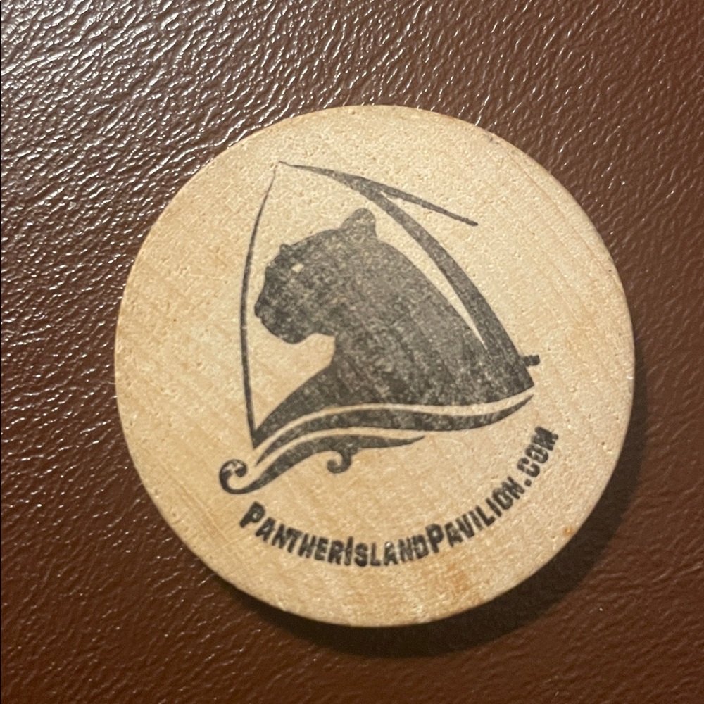Panther Island Pavilion Wooden token